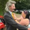 A tie adjustment is made, Rob and Wilma's Wedding, Thornham and Thrandeston, Suffolk - 6th August 2011