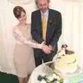 Wilma and Rob cut the cake, Rob and Wilma's Wedding, Thornham and Thrandeston, Suffolk - 6th August 2011