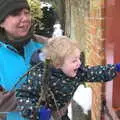 Fred clings on to a gate, Winter Walks with Sis and Matt, Brome and Thornham, Suffolk - 11th February 2012