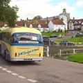 The coach trundles off through Finchingfield, The BSCC Cycling Weekend, The Swan Inn, Thaxted, Essex - 12th May 2012