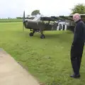 Grandad scopes out an Auster, A Few Hours at Hardwick Airfield, Norfolk - 20th May 2012