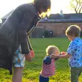 Fred holds Harry up as he potters around, Rosie and Henry's Birthday Party, Mellis, Suffolk - 5th May 2013