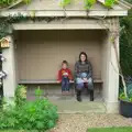 Fred and Isobel pause in a fake stone building, Eye Open Gardens, Suffolk - 1st June 2013