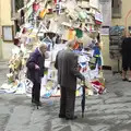 Passers-by inspect the pile of books, Marconi, Arezzo and the Sagra del Maccherone Festival, Battifolle, Tuscany - 9th June 2013
