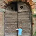 Fred inspects an old door, Marconi, Arezzo and the Sagra del Maccherone Festival, Battifolle, Tuscany - 9th June 2013