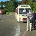 An old coach picks up passengers for Sheringham, Paul Bear's Adventures at a 1940s Steam Weekend, Holt, Norfolk - 22nd September 2013