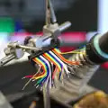 Time for some soldering, on rainbow ribbon cable, SwiftKey Innovation, The Hub, Westminster, London - 21st February 2014