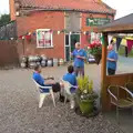 Apple and Pippa sit outside the pub, Underpants, Moths and The BSSC at The Greyhound - Tibenham, Norfolk - 6th July 2015