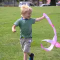 Harry runs around with the finishing tape, A Race For Life, The Park, Diss, Norfolk - 16th August 2015