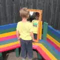 Harry checks himself out in the mirror, Eye Primary Summer Fayre, Eye, Suffolk - 9th July 2016