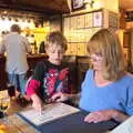 Fred helps Grandma J with the menu, The Tom Cobley and Castle Drogo, Spreyton and Drewsteignton, Devon - 11th August 2016