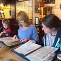 Isobel looks at menus too, The Tom Cobley and Castle Drogo, Spreyton and Drewsteignton, Devon - 11th August 2016