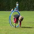 Fred hurls himself through moving hula-hoops, The Tom Cobley and Castle Drogo, Spreyton and Drewsteignton, Devon - 11th August 2016