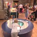 Fred looks down the well, Swordfights at Norwich Castle, Norwich, Norfolk - 31st August 2016