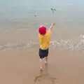 Harry hurls sand back into the sea, A Wet Day at the Beach, Sea Palling, Norfolk - 16th July 2017