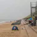 Brave beach-goers brave the rain under umbrellas, A Wet Day at the Beach, Sea Palling, Norfolk - 16th July 2017