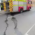 Water leaks onto the street, Fire and Water: The Burning of the Blackrock Centre, County Dublin, Ireland - 12th August 2017