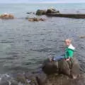 Harry sits on a rock, Fire and Water: The Burning of the Blackrock Centre, County Dublin, Ireland - 12th August 2017