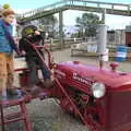 The boys mess around on an old McCormick Farmall , Pumpkin Picking at Alstede Farm, Chester, Morris County, New Jersey - 24th October 2018