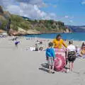 Isobel unfurls our beach blanket, A Walk up a Hill, Paella on the Beach and Granada, Andalusia, Spain - 19th April 2018