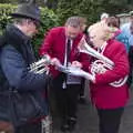 The band consults on the 'set list', A St. George's Day Parade, Dickleburgh, Norfolk - 28th April 2019