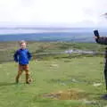 Isobel's hair is whipped around in the fierce wind, The Tom Cobley and a Return to Haytor, Bovey Tracey, Devon - 27th May 2019