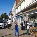 Harry looks at shops on Lymington Road, A Trip to the South Coast, Highcliffe, Dorset - 20th September 2019