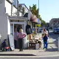 Isobel browses a charity shop, A Trip to the South Coast, Highcliffe, Dorset - 20th September 2019