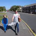 Harry and Isobel stride down Waterford Road, A Trip to the South Coast, Highcliffe, Dorset - 20th September 2019