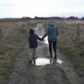 Harry and Isobel navigate the path back, To See the Seals, Horsey Gap, Norfolk - 10th January 2020