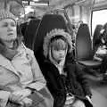 Isobel and Harry on the train, HMS Belfast and the South Bank, Southwark, London - 17th February 2020