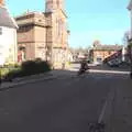 A lone cyclist pedals up Church Street, An April Lockdown Miscellany, Eye, Suffolk - 10th April 2020
