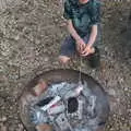 Harry sticks his marshmallow in the embers, An April Lockdown Miscellany, Eye, Suffolk - 10th April 2020