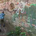 Harry runs past some graffiti, A Walk Around Abbey Bridges, Eye, Suffolk - 5th July 2020