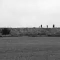 Walkers on the sea wall, A Trip to Orford, Suffolk - 29th August 2020