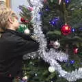 Harry reaches into the tree, Frosty Rides and a Christmas Tree, Diss Garden Centre, Diss, Norfolk - 29th November 2020