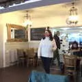 Isobel roams around Caféye after paying up, A Virtual New Year's Eve, Brome, Suffolk - 31st December 2020