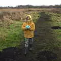 Harry grabs a ball of dark earth, A Walk Around Redgrave and Lopham Fen, Redgrave, Suffolk - 3rd January 2021