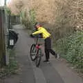 Harry gets back on his bike after a push up the hill, The Mean Streets of Eye, Suffolk - 7th March 2021