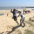 The boys jump off the dunes, A Day at the Beach with Sis, Southwold, Suffolk - 31st May 2021