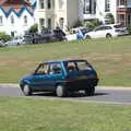 A rare mint-condition Austin Metro Rio trundles by, A Day on the Beach, Southwold, Suffolk - 18th July 2021