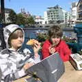 The boys scoff doughnuts by the river, A Trip to Manorhamilton, County Leitrim, Ireland - 11th August 2021