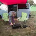 Allyson pokes around in a barbeque, Maui Waui Festival, Hill Farm, Gressenhall, Norfolk - 28th August 2021