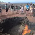 After a while, the bundle of hay ignites, The Volcanoes of Lanzarote, Canary Islands, Spain - 27th October 2021