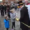 A girl shows off her toy rabbit to the mace bearer, The GSB and Remembrance Day Parades, Eye and Botesdale, Suffolk - 14th November 2021