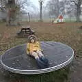 Harry has a spin around in the playground, A Return to Thornham Walks, Thornham, Suffolk - 19th December 2021