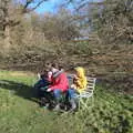 We eat a snack on the bench by the lake, A Visit to Blickling Hall, Aylsham, Norfolk - 9th January 2022