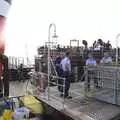 Crew hang around on the gangway, The Waverley Paddle Steamer at Southwold Pier, Suffolk - 27th September 2023