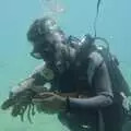 A diver floats by with a lobster, The Cats of Rhodes, Ρόδος, Greece - 24th October 2023