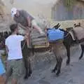 A tourist struggles onto a donkey, A Trip to Lindos and More Cats of Rhodes, Ρόδος και Λίνδος, Greece - 28th October 2023